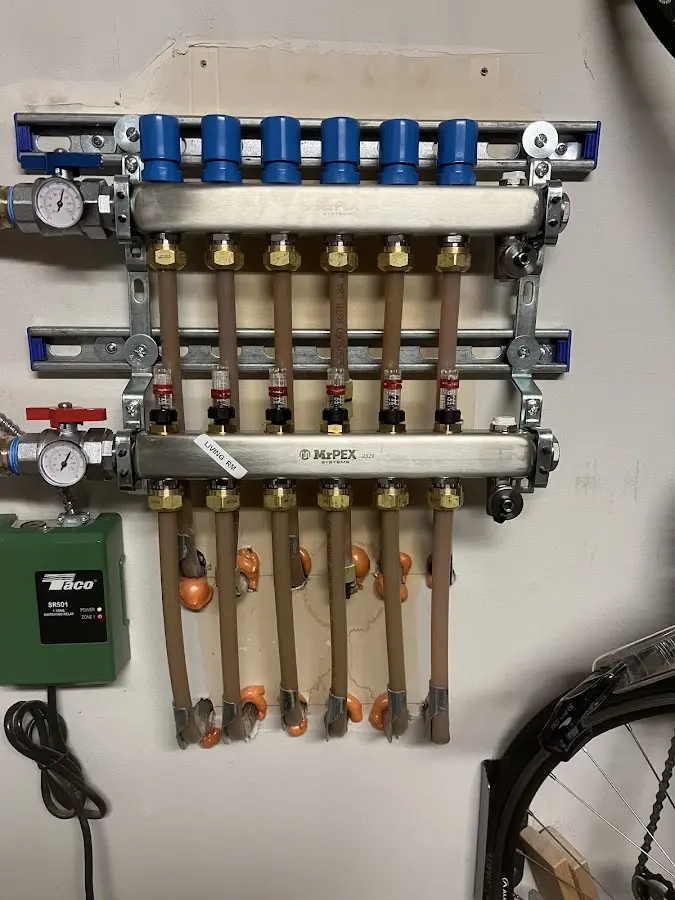 Plumber performing Water Heater Repair at a residential property in Huntingtown